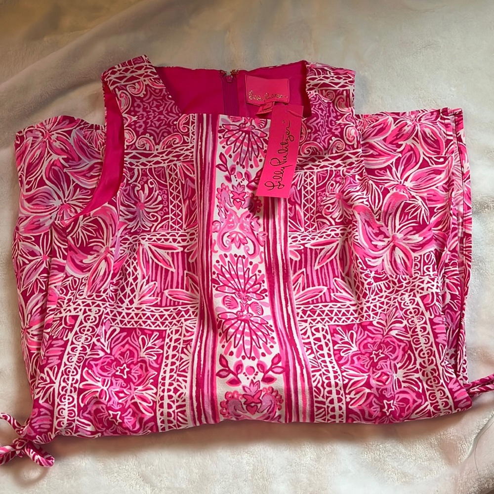 Never worn, with tags